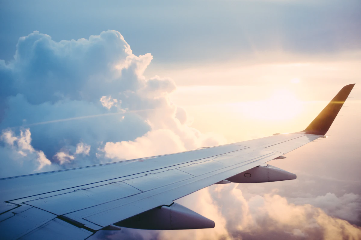 Aircraft in flight above the clouds